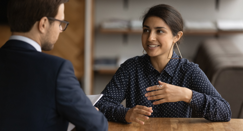 Digital Learning Needs To Become Better at Preparing Learners for the World of Work. Here’s How - two people sit at a table talking