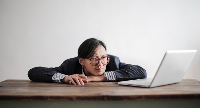 Man sits at computer using the insendi platform-2