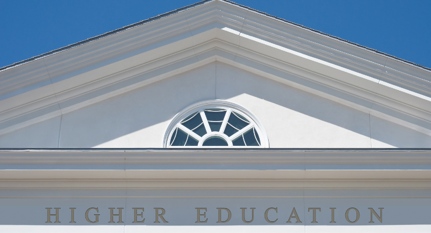 Why Digital Transformation Fails in Higher Education Institutions - image of the front of a building that says higher education