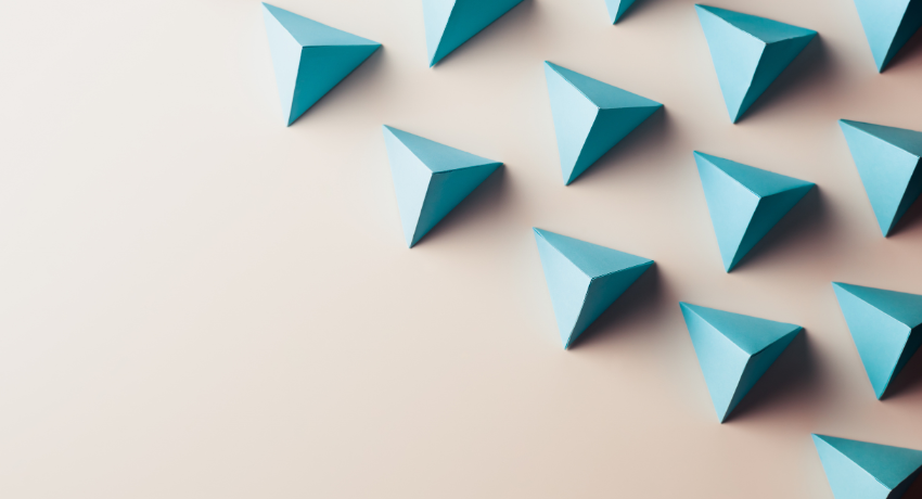 duplicates of the same blue pyramid shape are lined up consistently in rows